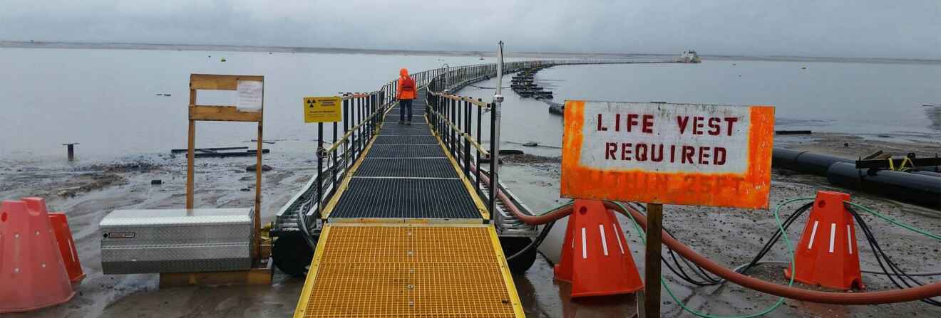 Pivot and walkways Xrosswater mining dredging pond in Canada
