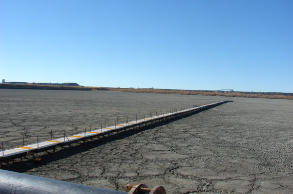 Walkways and pump platforms in Diamon mining tailings pond in Botswana Africa